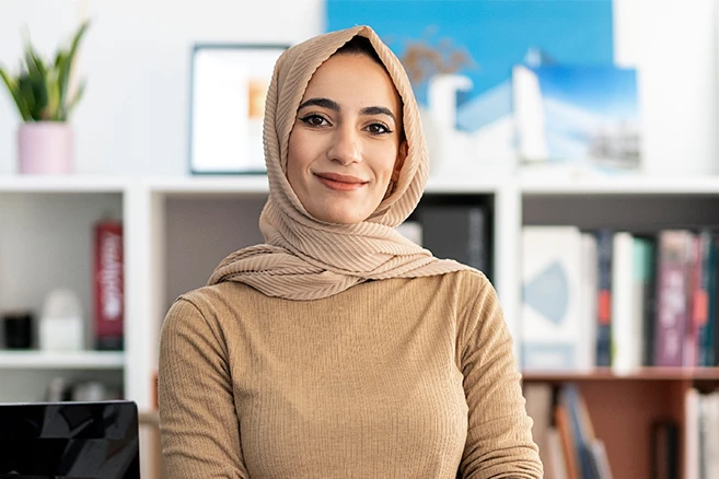 Lady with head scarf smiling