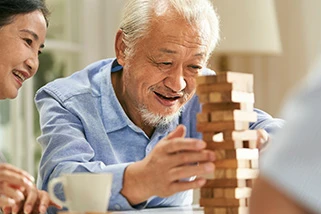 Family playing Jenga